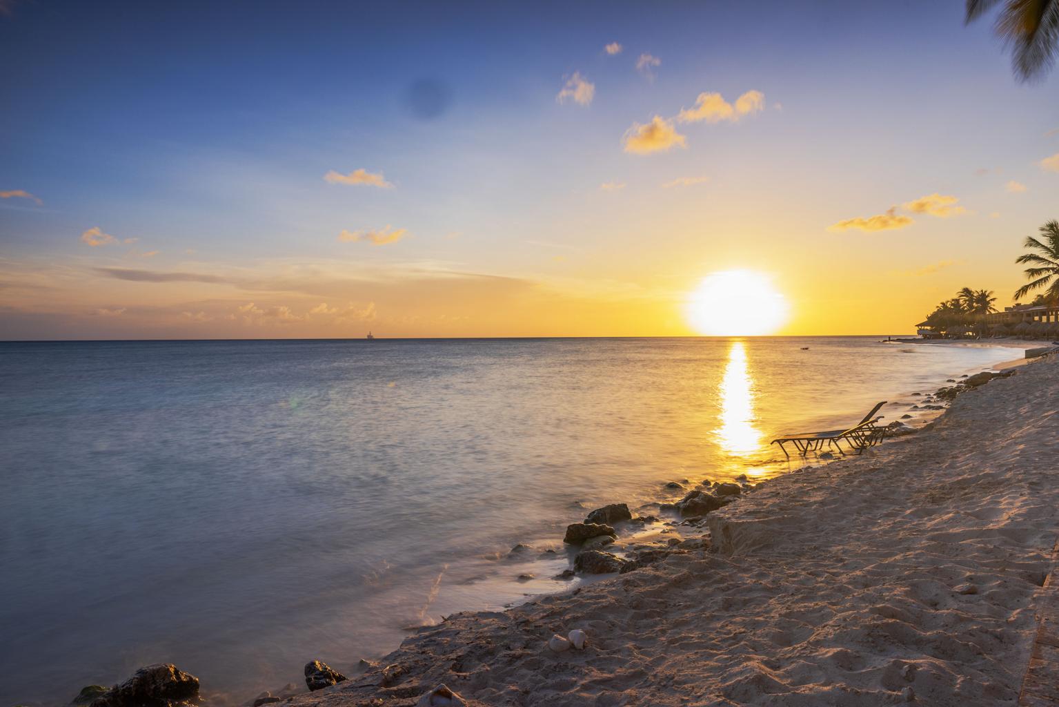 aruba sunset beach golden hour caribbean