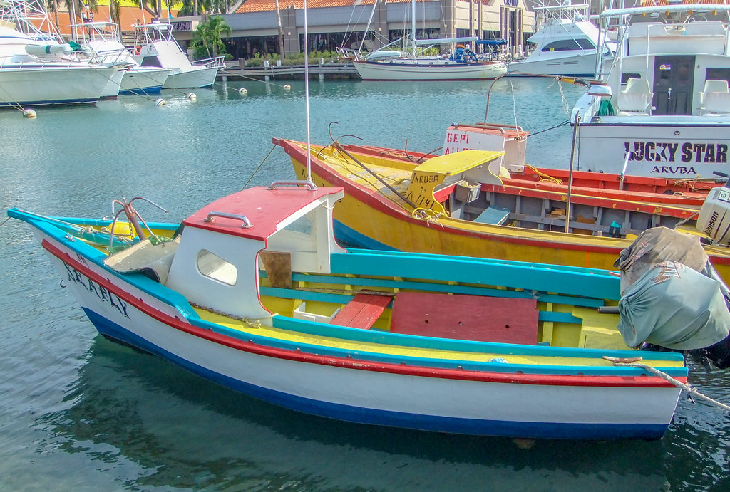 aruba local life small docks boats coast
