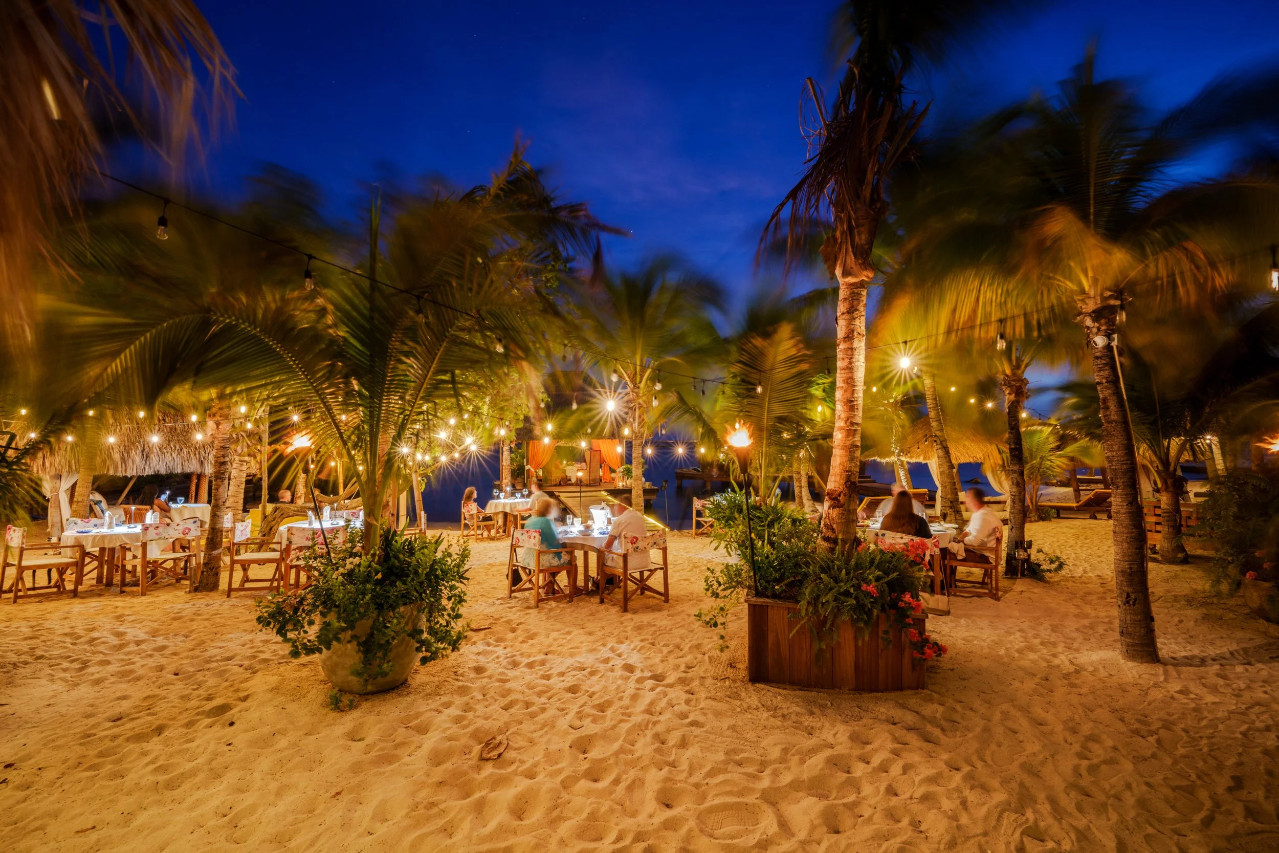 beachfront restaurant aruba night ocean reflection